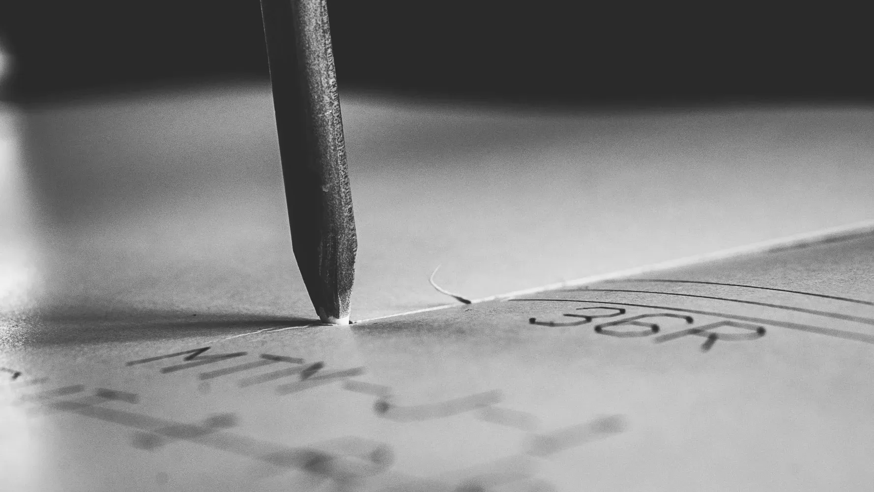 A pencil drafting a personal paper pattern by hand